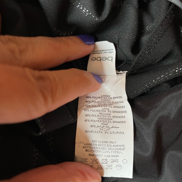 Pinstripe halter jumpsuit by Bebe preloved size 0. There is no stretch. - Picture 7 of 8